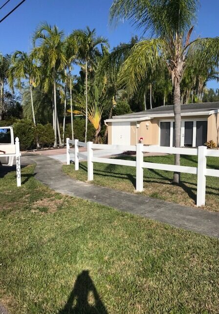 driveway fence parking lot jupiter